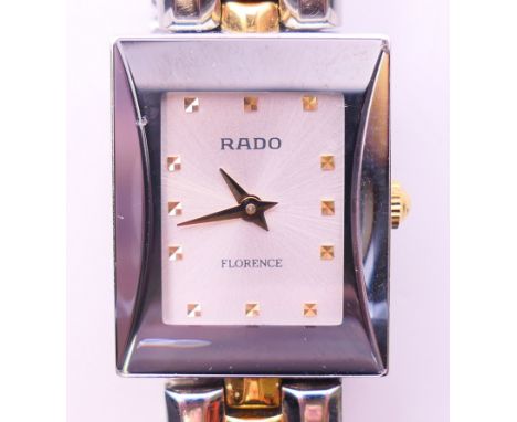 A boxed RADO ladies wristwatch with warranty card. 2 cm wide. 