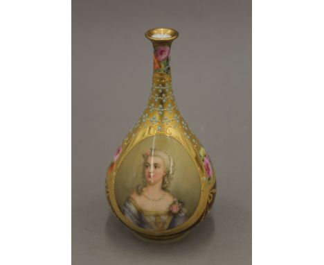 A late 19th century claret ground jewelled and gilded Vienna porcelain bottle vase, the central panel painted with a portrait