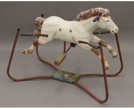 A vintage rocking horse. 85 cm long.