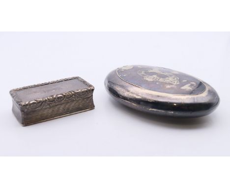 A silver rectangular snuff box and a plated snuff box.  Rectangular box 7 x 3.75 cm. 
