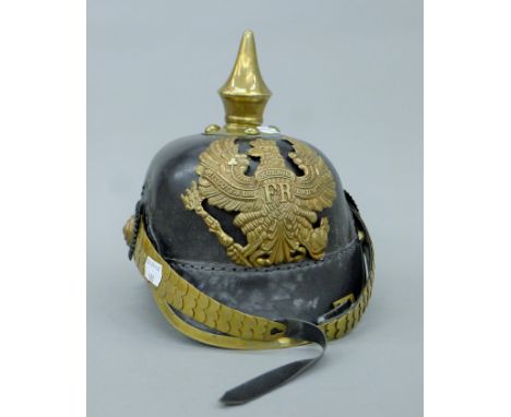 A replica Picklehaub helmet. 23 cm high.