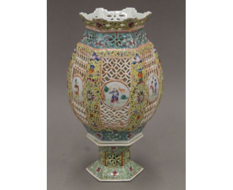 A late 19th century Chinese porcelain lantern and stand of typical form and decoration. 30 cm high.