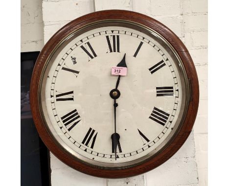 A late 19th/early 20th century oak cased painted dial circular single face wall clock with pendulum, diameter 44cm 
