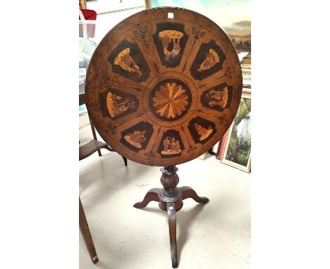 A 19th century walnut occasional table with circular tilt top, extensive inlaid panels featuring figures in period costume, o