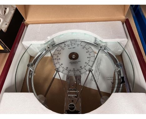 Camry Mechanical Personal Scale unused; an ab Swing Pro with manual and a Trim Flex body sculptor. 