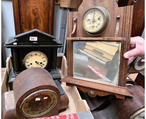A 19th century mantel clock in architectural ebonised case; a manel clock with chime; a barometer/brush rack 