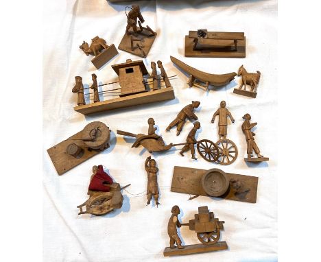 A collection of Chinese wooden figures working etc. 