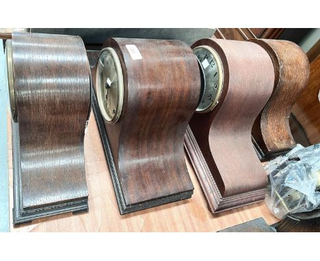 A 1930's chiming mantel clock in mahogany case; 2 similar oak cased clocks with strike; etc. 