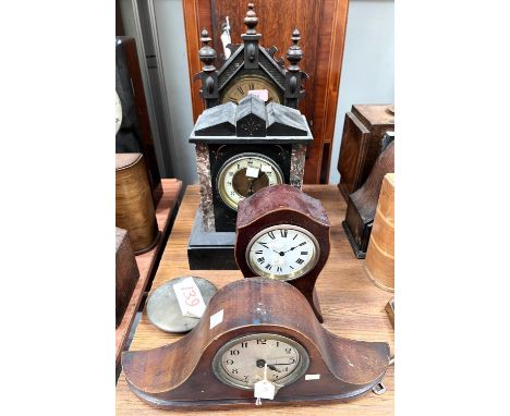 A mantel clock in architectural black marble case; a similar 19th century American clock; 2 others 