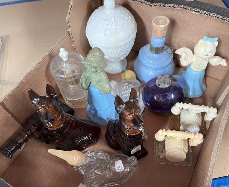A selection of vintage Avon and other scent bottles in the form of dogs etc 