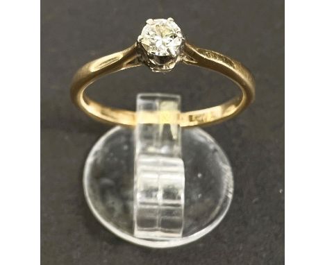 A yellow metal ring set diamond solitaire, 3.5mm diameter approx, size K/L, 2gm 