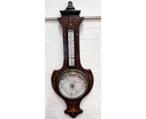 An Edwardian aneroid barometer with thermometer in banjo shaped inlaid rosewood case (glass cracked) 