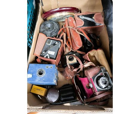 A leather 1950's Havana cigarette case, a chrome Wales cigarette case similar; a selection of vintage cameras and equipment; 