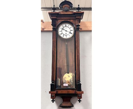 A 19th century single weight Vienna wall clock in walnut veneered and ebonised case, 114cm 