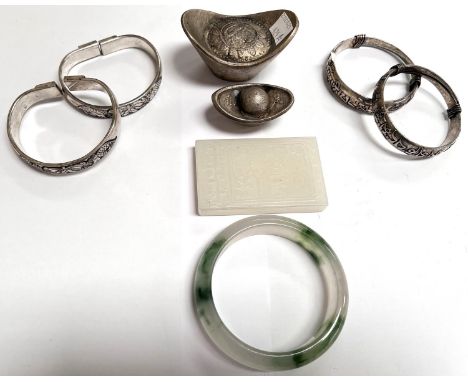 A Chinese Jade coloured hardstone tablet, two Chinese weights etc 