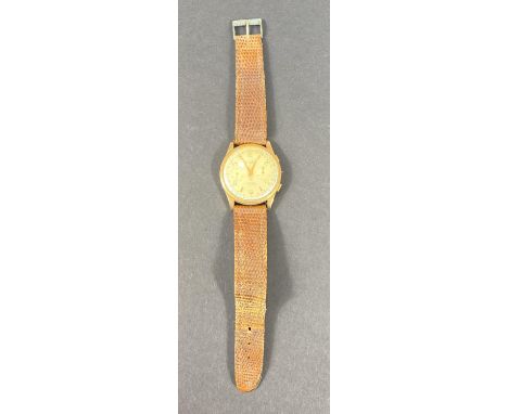 An 18k stamped vintage chronograph wristwatch, Swiss movement (no winder) on leather strap, 37mm dia. gross weight 35gm 