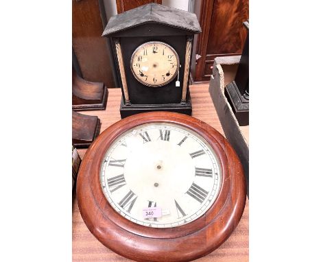 A 19th century wall clock with circular dial, in mahogany case; a striking mantel clock in architectural case 