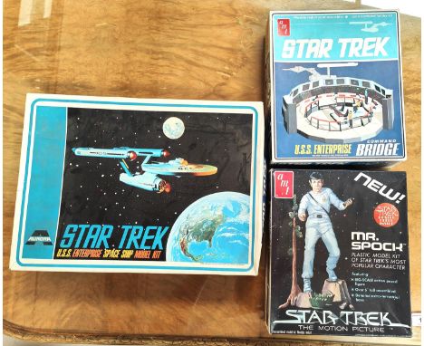 Three vintage Star Trek un-assembled model kits in original boxes, 'amt U.S.S Enterprise Bridge', 'amt Mr. Spock' and Star Tr