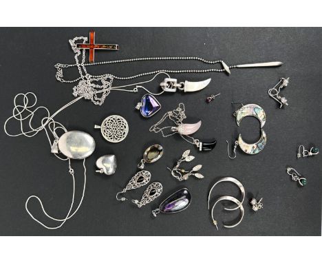 A selection of modern silver jewellery including Celtic style pendant, 3 'shark tooth' hardstone pendants, other pendants, ch