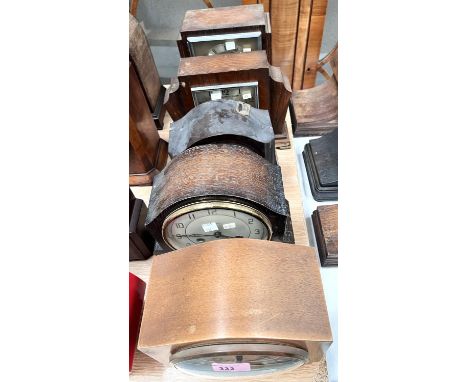 Four 1930's mantel clocks with strike; a similar clock 