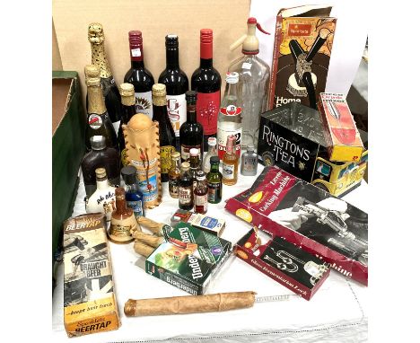 A selection of miniature alcohol, vintage soda syphons and other alcohol related items 