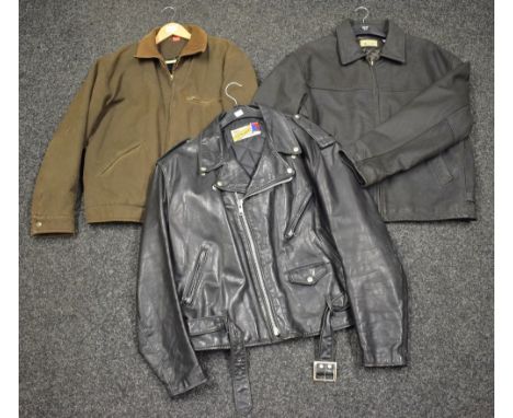 A Vintage Schott Perfection black leather biker jacket, size 48;  another Tex Buffalo hide, size large; another brown size me