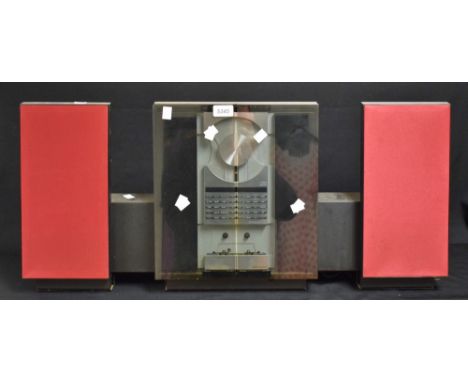 Bang & Olufsen Beosystem stereo, angled face, red speaker cloth, sliding glass door