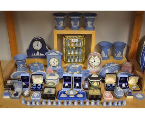 A Wedgwood Jasperware mantel clock, two others, various thimbles, some boxed, pomander, trinket pots, boudoir candlesticks, a