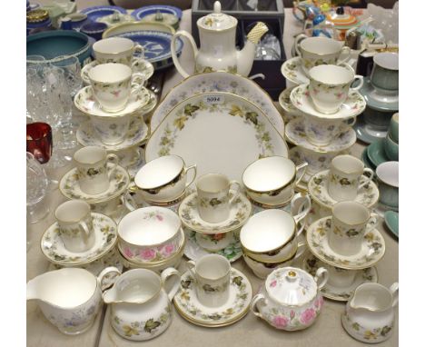 A Royal Doulton Larchmont pattern coffee and tea set; a Colclough tea set printed with blue flowers; a set of six Colclough d