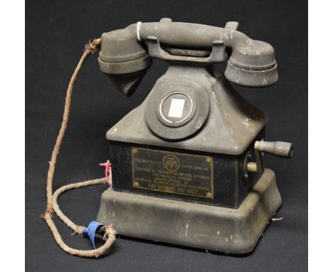 A vintage ATM wind up cradle telephone marked Certified by the Ministry of Fuel and Power for Parallel Working, manufactured 