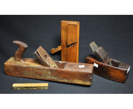 Woodworking tools - F.V. Hill Grays moulding plane, 24cm length; W. Parkes plane, 42cm length; one other; wooden spirit level