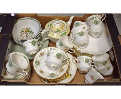 Ceramics - a Royal Stafford tea set, eleven tea cups and saucers, side plates and teapot; Royal Albert plain white gilded tea