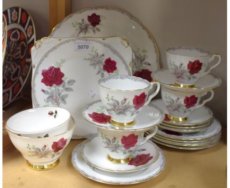 Ceramics - Royal Stafford China part tea service, Red Rose, four cups, six saucers, six tea plates, cake plate, bread and but
