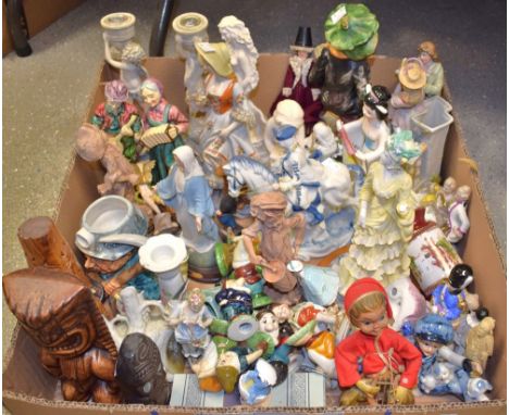 A set of ceramic Snow White and the Seven Dwarves figures; other decorative ceramic figures, candlesticks; similar resin grou