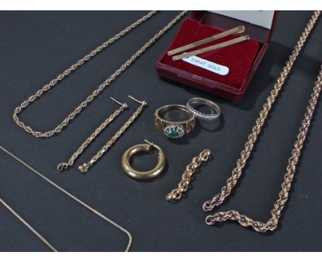 Mixed lot of 9ct and yellow metal tie pins, chains and rings weight 33.9 grams