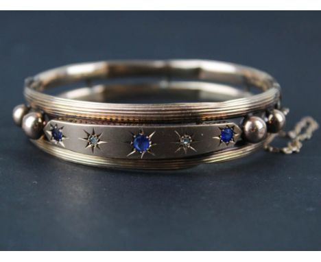 9ct bangle set with sapphires and diamonds with safety chain weight 13.5 grams