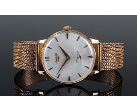 In its box of issue Longines Flagship Gents 9ct Wristwatch, white enamel dial with gold batons and a second hand. weight 70 g