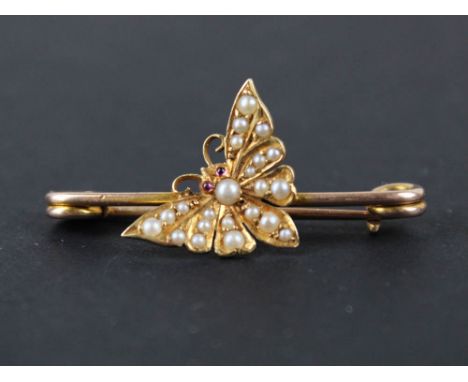 Yellow Metal Bar Brooch with Butterfly set with seed pearls and Amethyst weight 2.5 grams