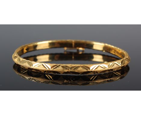 Cased Yellow Metal Bangle with receipt from Hong Kong dealer weight 17 grams