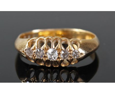 Yellow Metal Ring, Pierced Head set with five Diamonds, size K, 3.4 grams