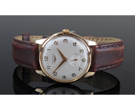 Longines 9ct Wristwatch white enamel face with Roman numerals and a second hand on a brown leather strap