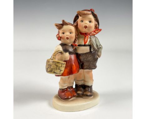 A hand painted matte figure of Hansel and Gretel with a curious expression. Goebel backstamp. M.I. Hummel. Issued: 1938-2010D