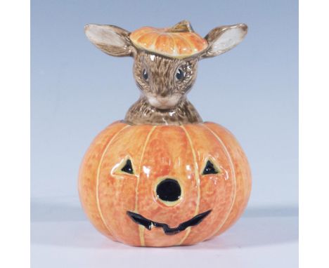 A figure of bunny popping out of a pumpkin Jack-O-Lantern. Royal Doulton backstamp. Artist: G. TongueIssued: 1993 - 1997Dimen