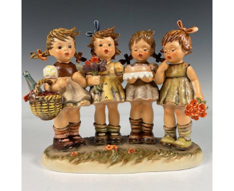 Hand painted in matte finish modeled as four young girls carrying goodies. Sixth issue in Century Collection. M. I. Hummel im