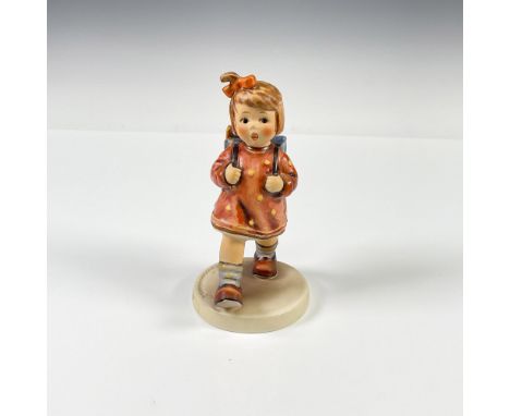Hand painted figure of a young girl with a backpack. Goebel backstamp. Hummel impressed mark. 467. Issued: 1999Dimensions: 3"