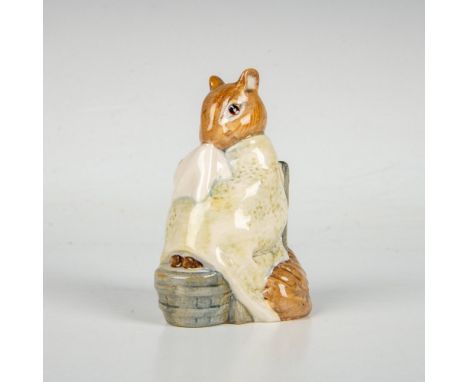 Depicts a squirrel having a foot bath while holding a handkerchief and wrapped in a pale green blanket. Beswick backstamp. Th