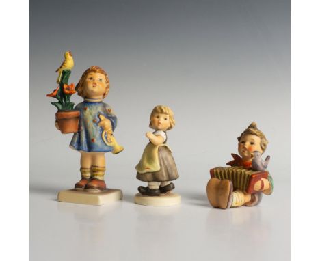 Lovely group of hand painted porcelain with matte finish. Features two adorable children with instruments accompanied by bird