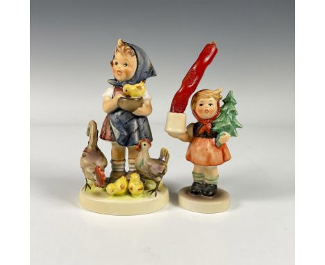 Includes two matte porcelain figures, Feeding Time HUM199/0, a girl feeding her chickens, and Girl with Fir Tree HUM116,a gir