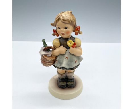 Hand painted exclusive edition figure of a young girl with a basket of wine. Goebel backstamp. This item has its original box