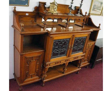 Edwardian walnut and leaded light cabinet